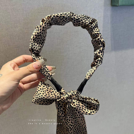 Leopard print hair band with floating ribbon